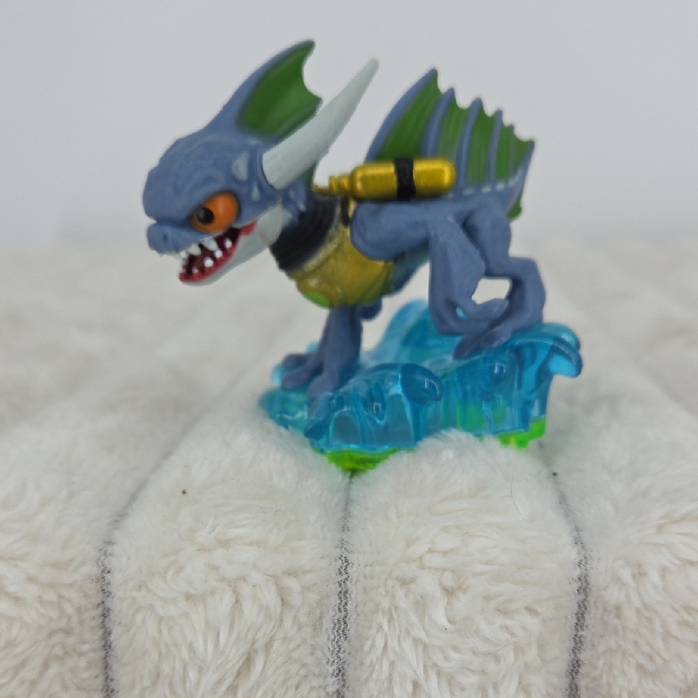 Vibrant Dragon Figurine on Wave